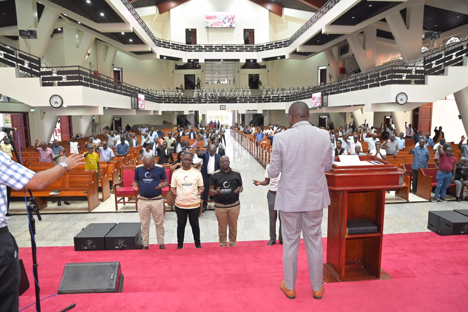 Men of many generations gathered in the cathedral